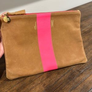 Claire V. clutch with pink stripe and initials JM